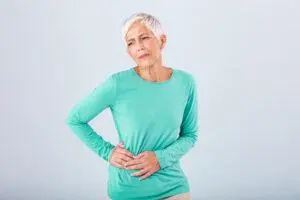 Older woman with pain in her side